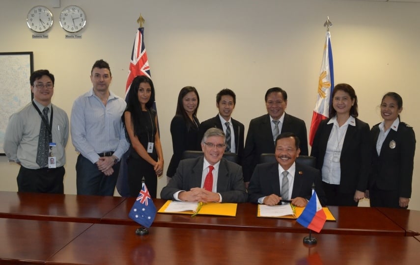 Australian Ambassador Bill Tweddell (seated, left) and Bureau of Immigrations (BI) Commissioner Ricardo A. David, Jr.  (seated, right) signed the Memorandum of Understanding for the implementation of a web-based Regional Movements Alerts System (RMAS), which will strengthen the BI’s capability in detecting lost, stolen and invalid travel documents, the prevention of their illegal use, and quick coordination with issuing authorities around the world.  Other officers of the Australian Embassy and the BI, including Assistant Commissioner Abdullah Mangotara (standing, third from right), served as witnesses.  Australia has been a constant partner in BI’s good governance initiatives, especially projects towards developing more efficient and effective border control and management systems.